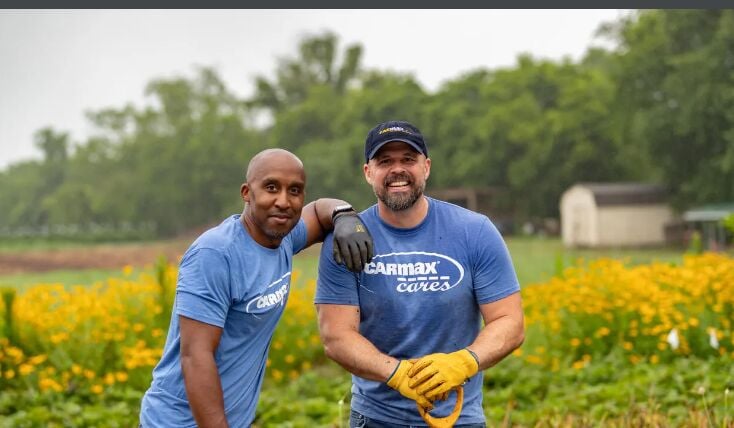 Edward Lockley (left) and Jason Ancarrow of CarMax volunteer at Shalom Farms